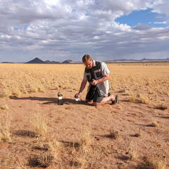 Stephan Getzin measuring soil moisture in a fairy circle (2024).
