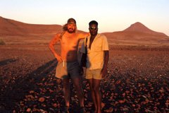 Two legends - Chris Bakkes and Vitalus Florry. Vitalus was able to identify “his” rhinos from their tracks in this rocky terrain. Chris survived an attack by two crocodiles and he wrote many books such as “In Bushveld and Desert: A Game Ranger's Life”.